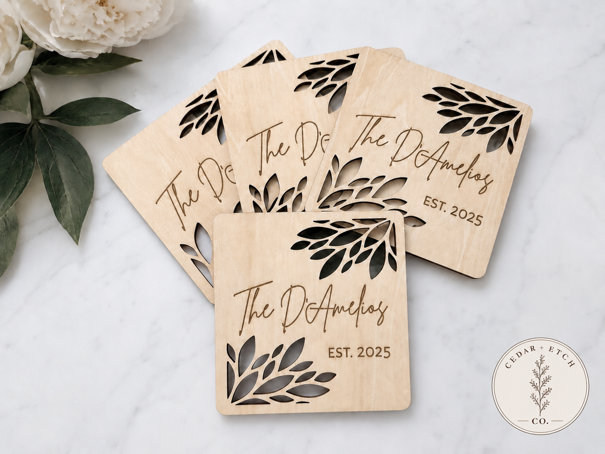 Personalized family name wood coaster with botanical cutout