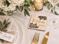 Personalized wood wedding favor coaster at reception place setting