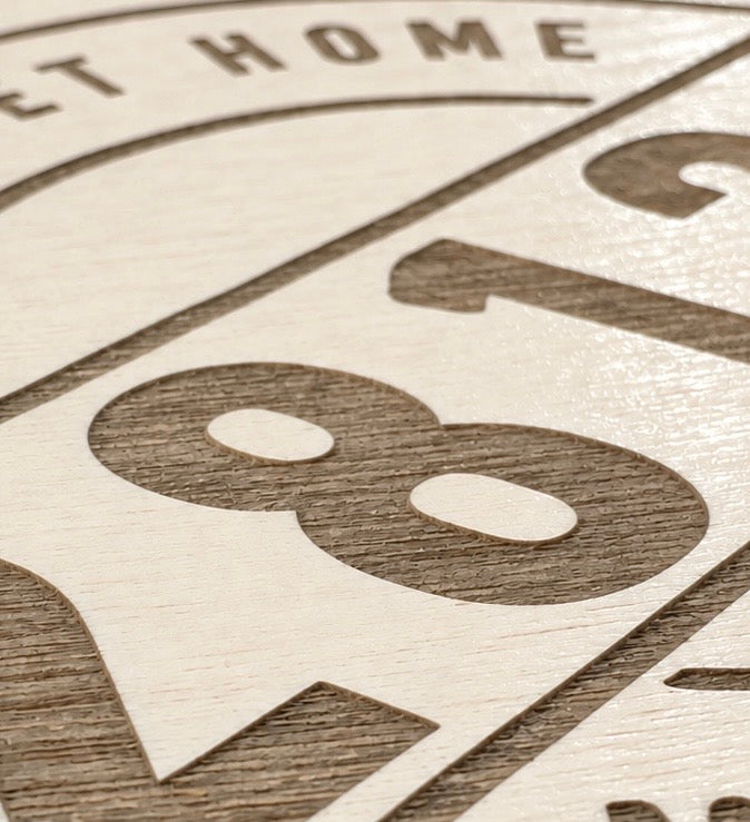 Close-up engraving detail of Home Sweet Home Zip Code ornament