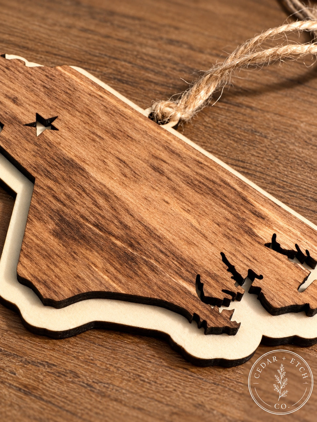 Close-up detail of North Carolina layered wood ornament